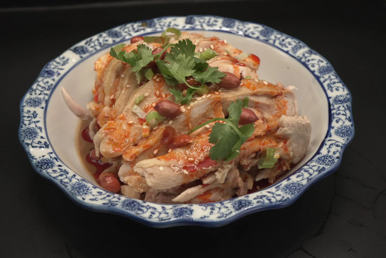 Sichuan - style saliva chicken with peanuts and sesame seeds at Lao Hu Tong, a Asian Restaurant in Schaumburg