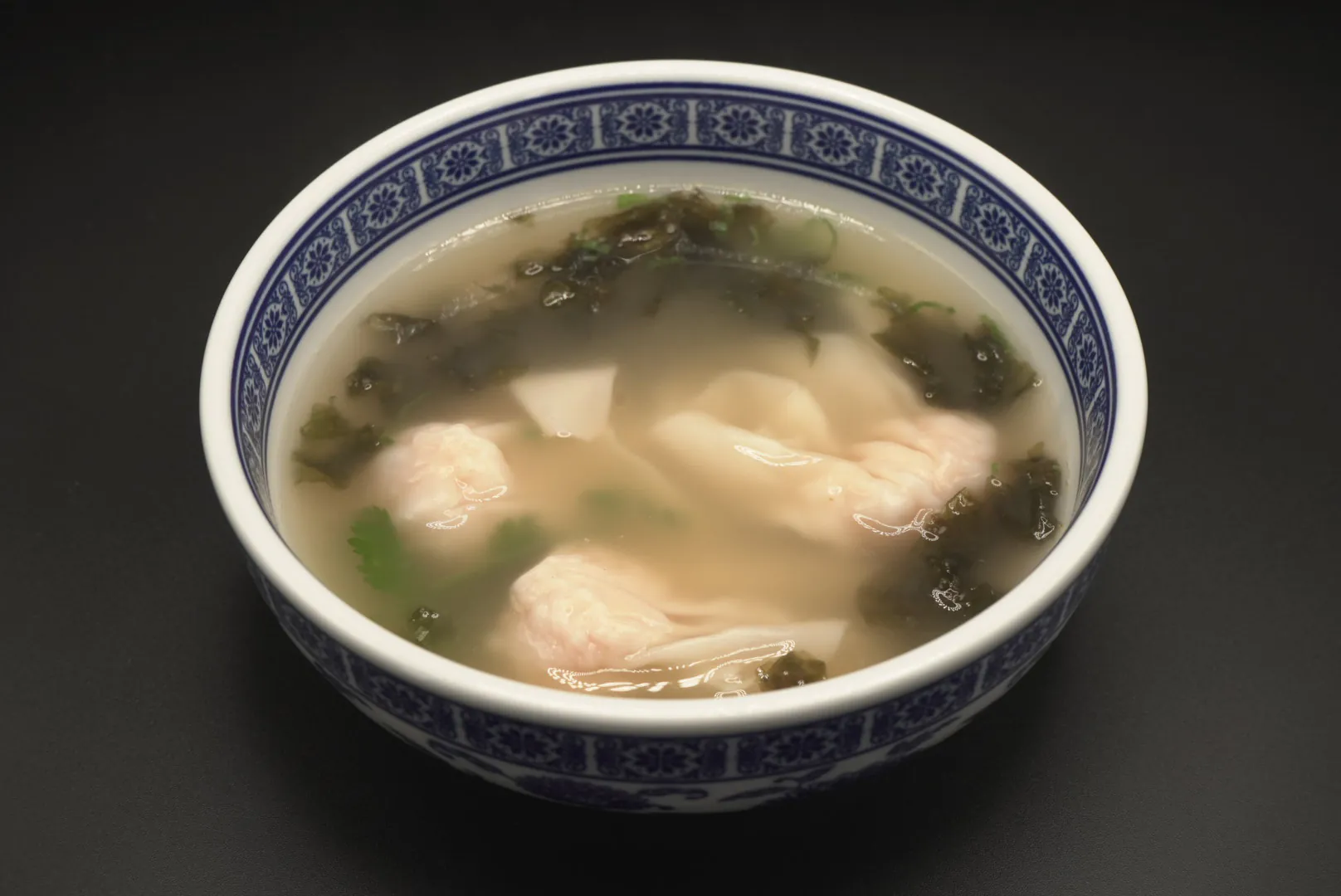 Wonton soup with seaweed and cilantro at Lao Hu Tong, a Asian Restaurant in Schaumburg